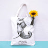 "ride bicycles not elephants" tote bag