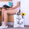 "ride bicycles not elephants" tote bag